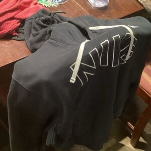 Nike Men's Black Hoodie with White Accents